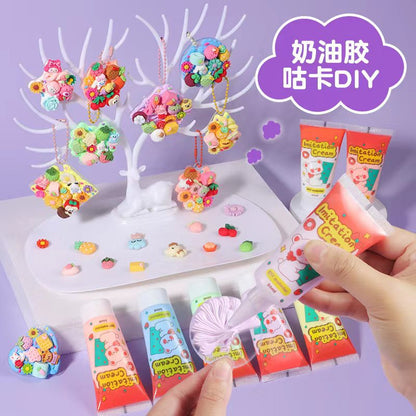 Colorful DIY craft items on a white stand with a hand holding small containers labeled 'Inspiration Cream' against a purple background.
