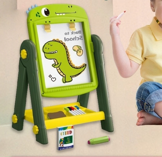 Children's drawing board with dinosaur illustration and child coloring on a beige background