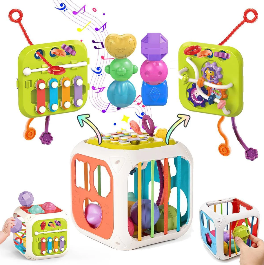 Colorful baby activity cube with various educational toys on a white background