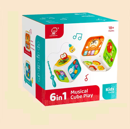 Box of a 6-in-1 musical cube toy with colorful design on a beige background