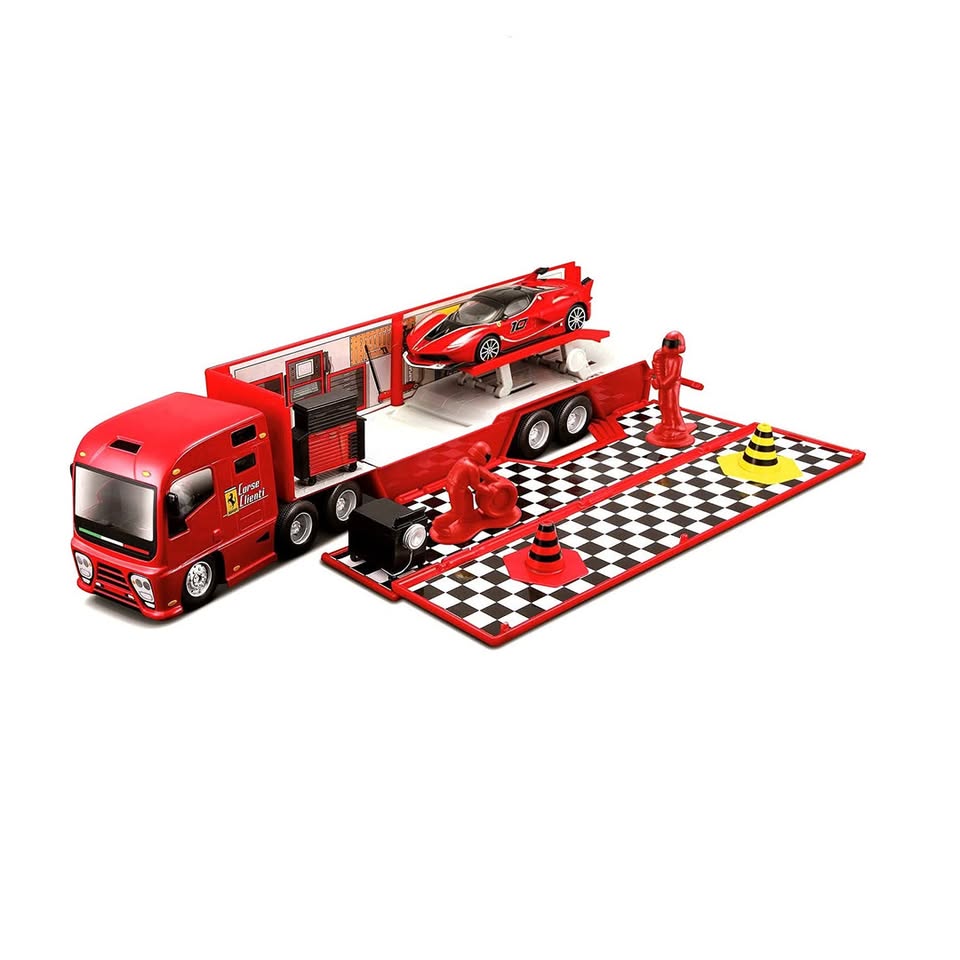 Red toy truck with a trailer carrying a red car on a checkered platform.