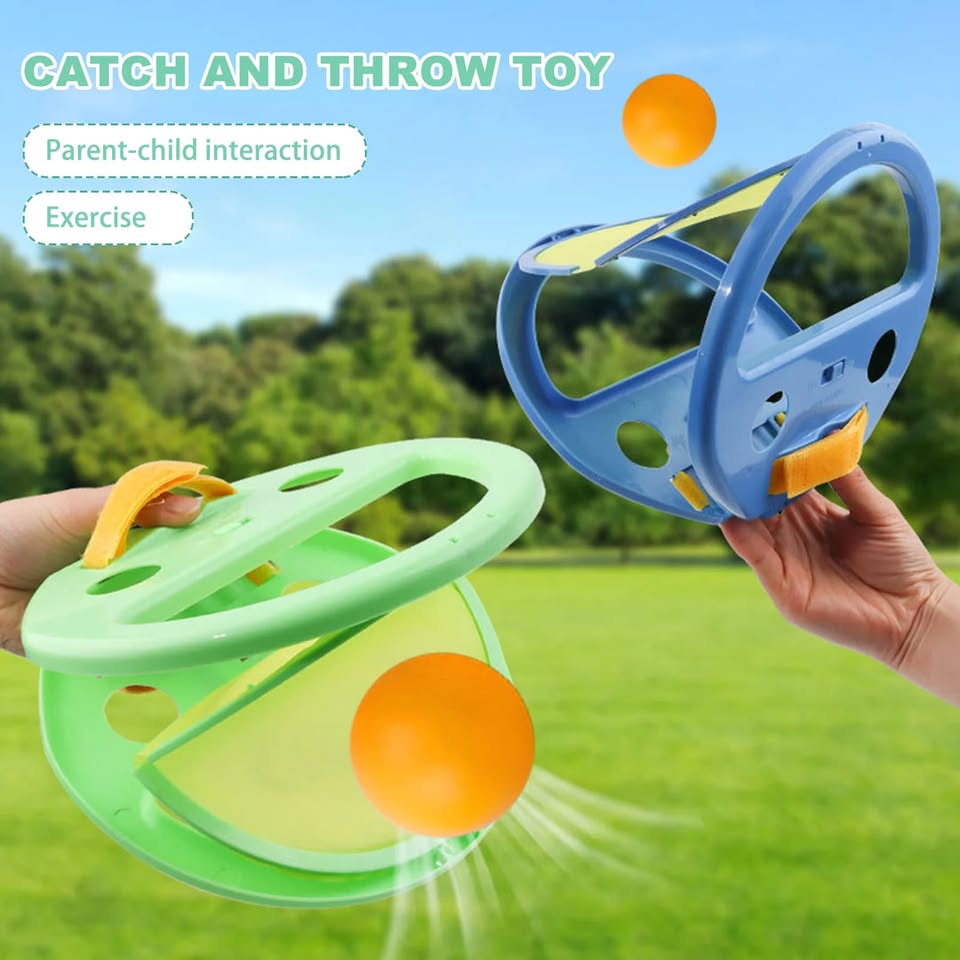 Two colorful 'Catch and Throw Toy' devices with orange balls on a grassy background.