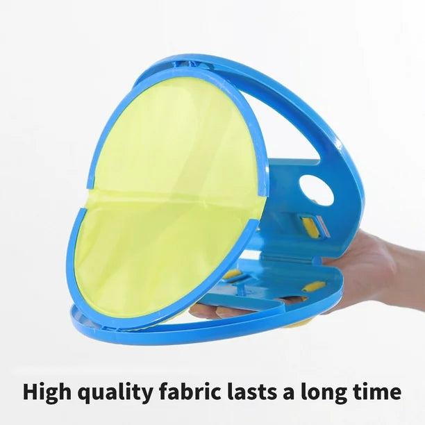 Blue and yellow fabric steamer held by a hand on a white background