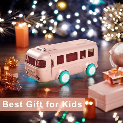Toy bus on a festive background with Christmas lights and decorations.
