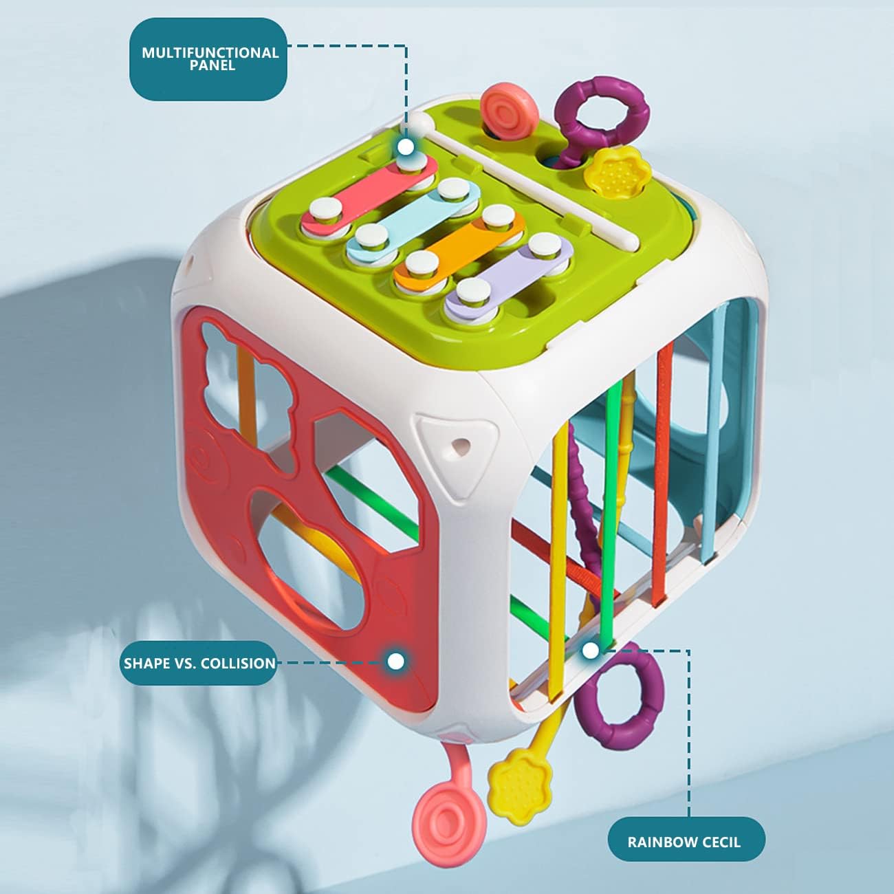 Colorful toy cube with various interactive elements on a light blue background