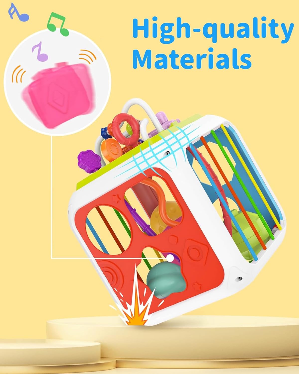 Colorful baby toy with various shapes and textures on a yellow background, labeled 'High-quality Materials'.