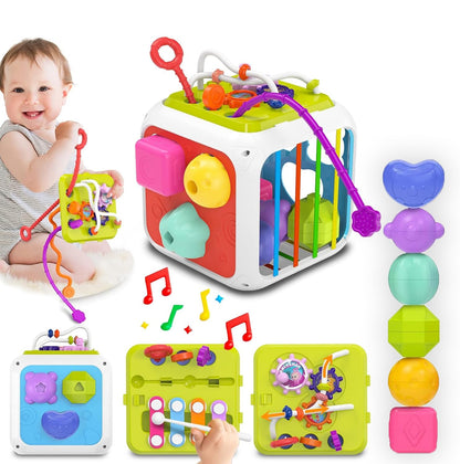 Colorful baby activity cube with various educational toys and a baby playing with it.