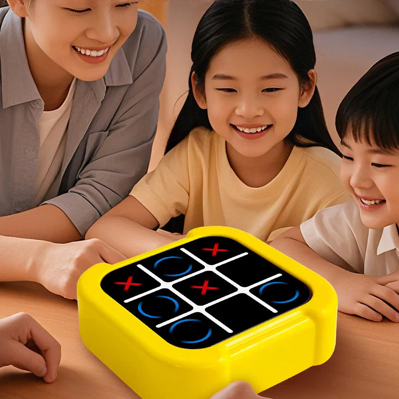 Children playing a game on a yellow box with a woman watching them