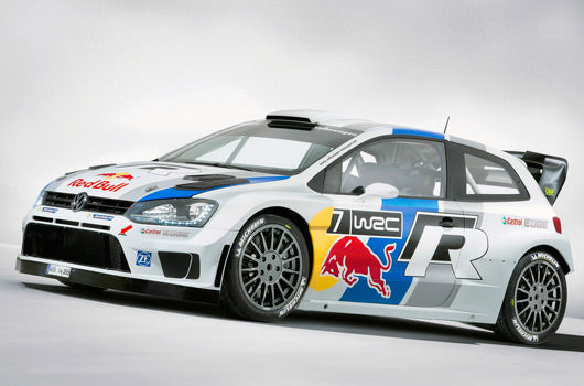 Racing car with Red Bull and WRC branding on a gray background