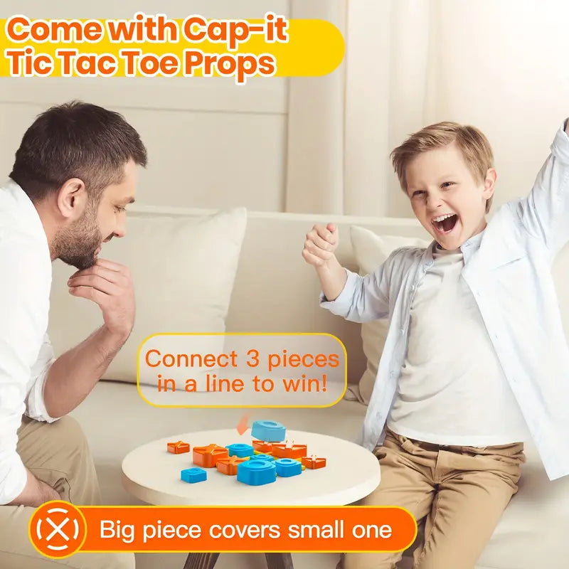 Man and child playing with Tic Tac Toe props on a couch
