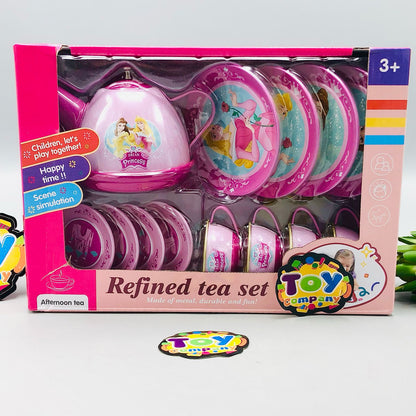 Toy tea set packaging with pink lid and cups, displayed on a white background.