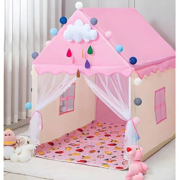 Pink children's play tent with colorful accents on a white floor.