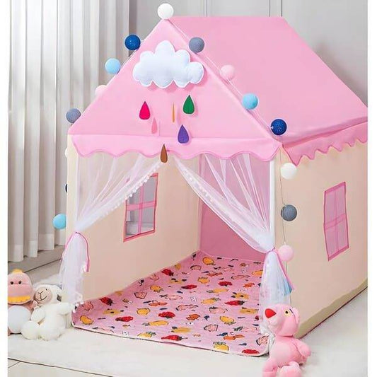 Pink children's play tent with colorful accents on a white floor.