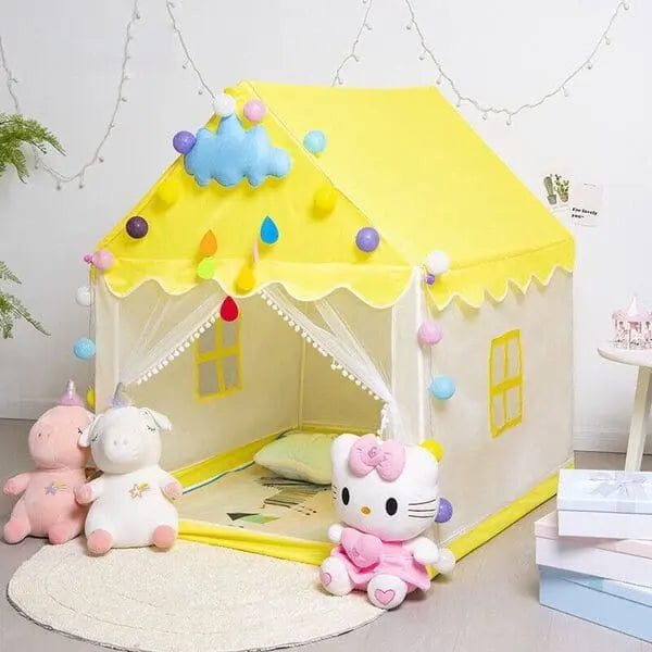 Children's play tent with colorful decorations and plush toys in a room.
