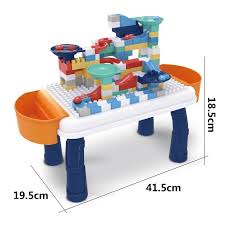 Children's toy water table with colorful components and dimensions displayed.